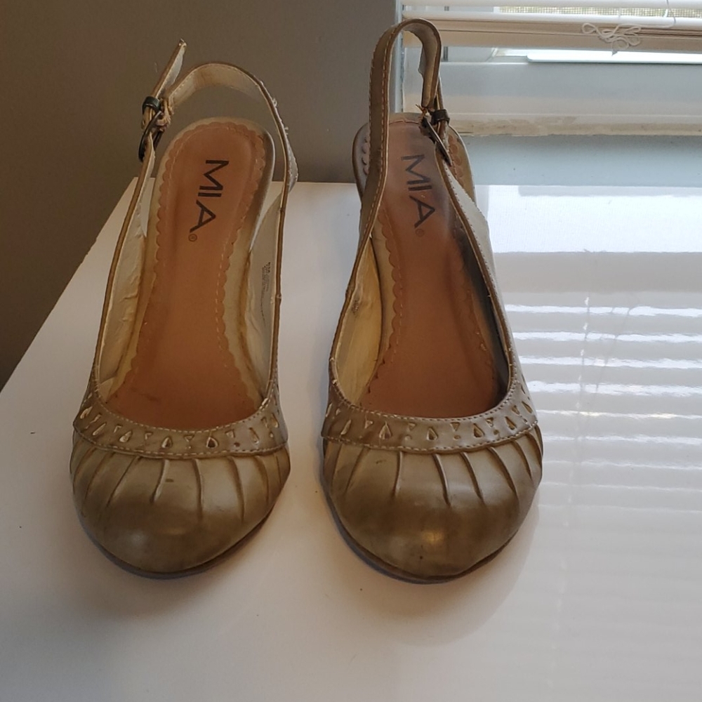 Mia's tan heels